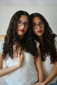 Why Do I Keep Attracting the Same Type of Person - two similar looking girls suggesting same person different relationship